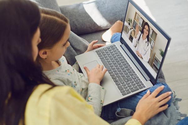 a mom and daughter on a telehealth call