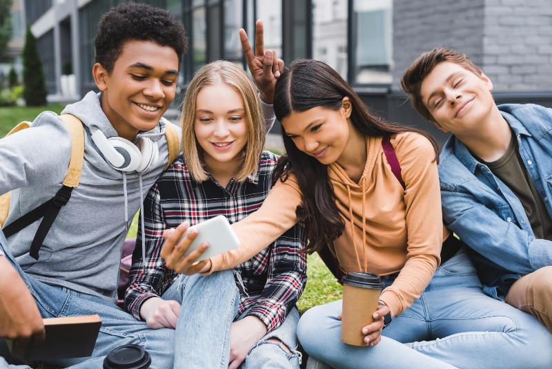 teens taking a selfie together